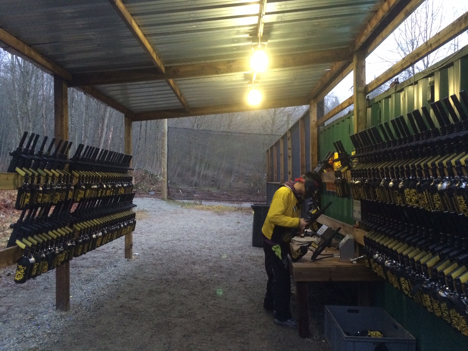 A Delta Force Canada team member checking equipment before play