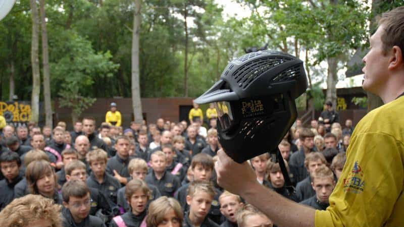 A Delta Force Canada team member delivering a clear equipment and safety briefing